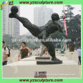 antique chinese man with playing football sculpture